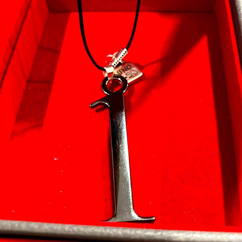 Guess number # 1 necklace with Uno de 50